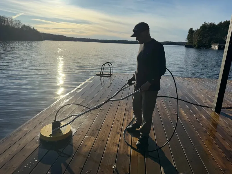 Professional deck cleaning in progress in Ontario